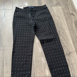 Black pants with white polka dots